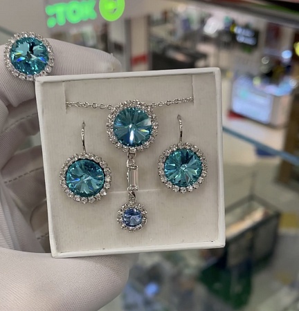 Комплект с кристаллами Light Turquoise в обрамлении